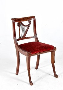 A rare form American harp-backed carved mahogany side chair 