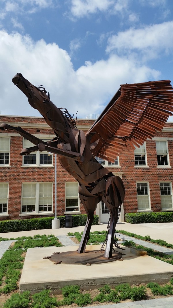 Oak Cliff Artist Stuart Kraft Created this steel Pegasus that stand in Downtown Dallas